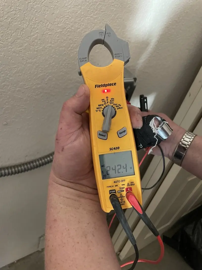 Voltage testing with clamp meter during Whole House Surge Protector in Lewistown